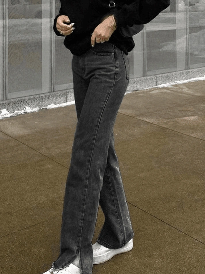 Faded Boyfriend Jeans with a Flirty Split. Get Yours Now.